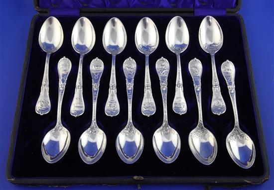 A cased set of twelve early 20th century American sterling silver Signs of the Zodiac teaspoons, 13 oz.
